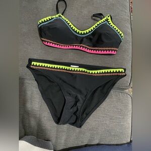Exhilaration women’s size M Black Bikini set with embroidered accents .